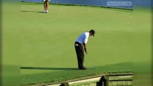 tiger woods fist pump after making double breaking putt
